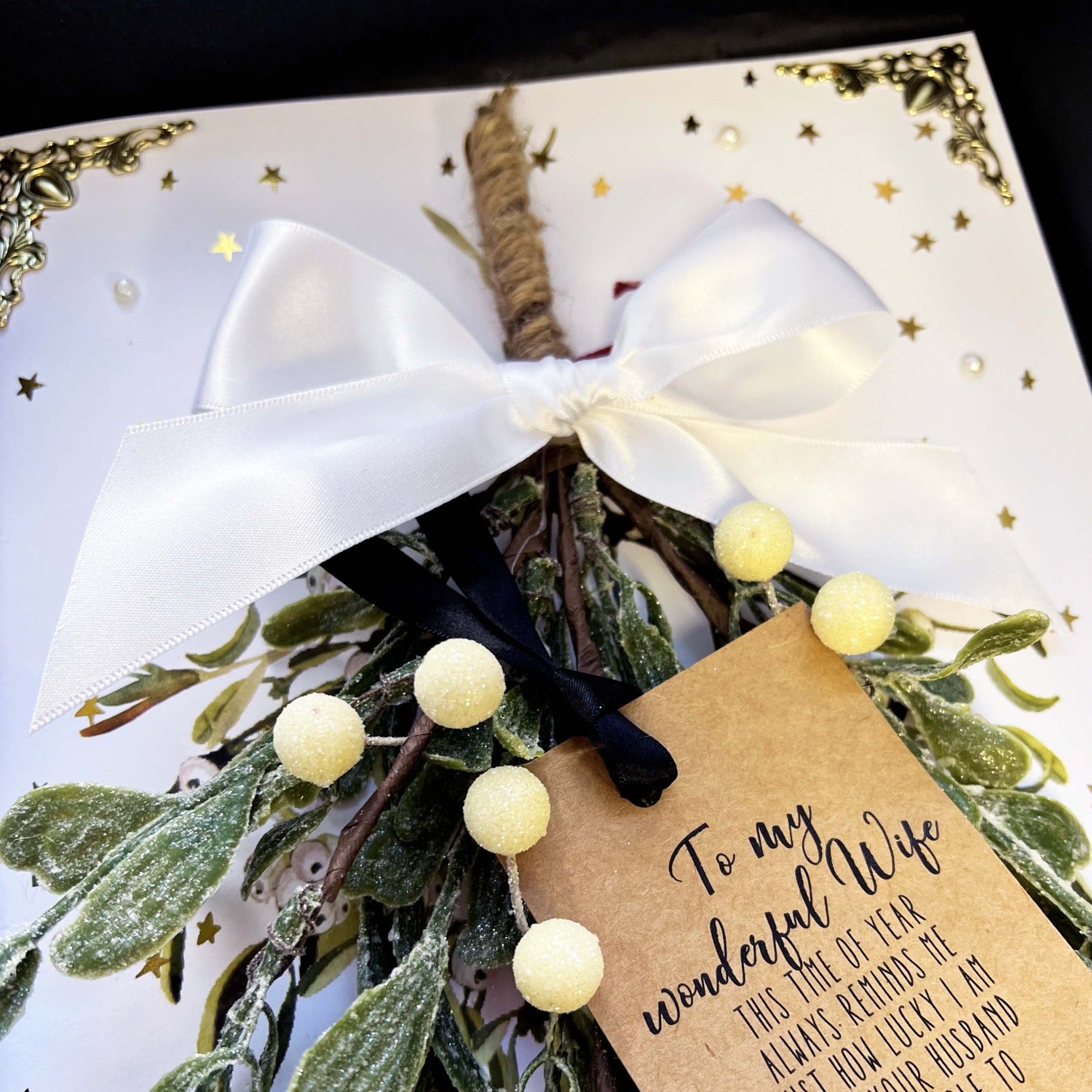 White ribbon on the mistletoe luxury christmas design