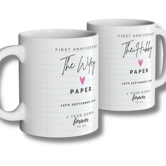 The Wifey Mug and The Hubby Mug personalised 1st anniversary gift - Two white mugs with personalized text for first anniversary gifts on a white background