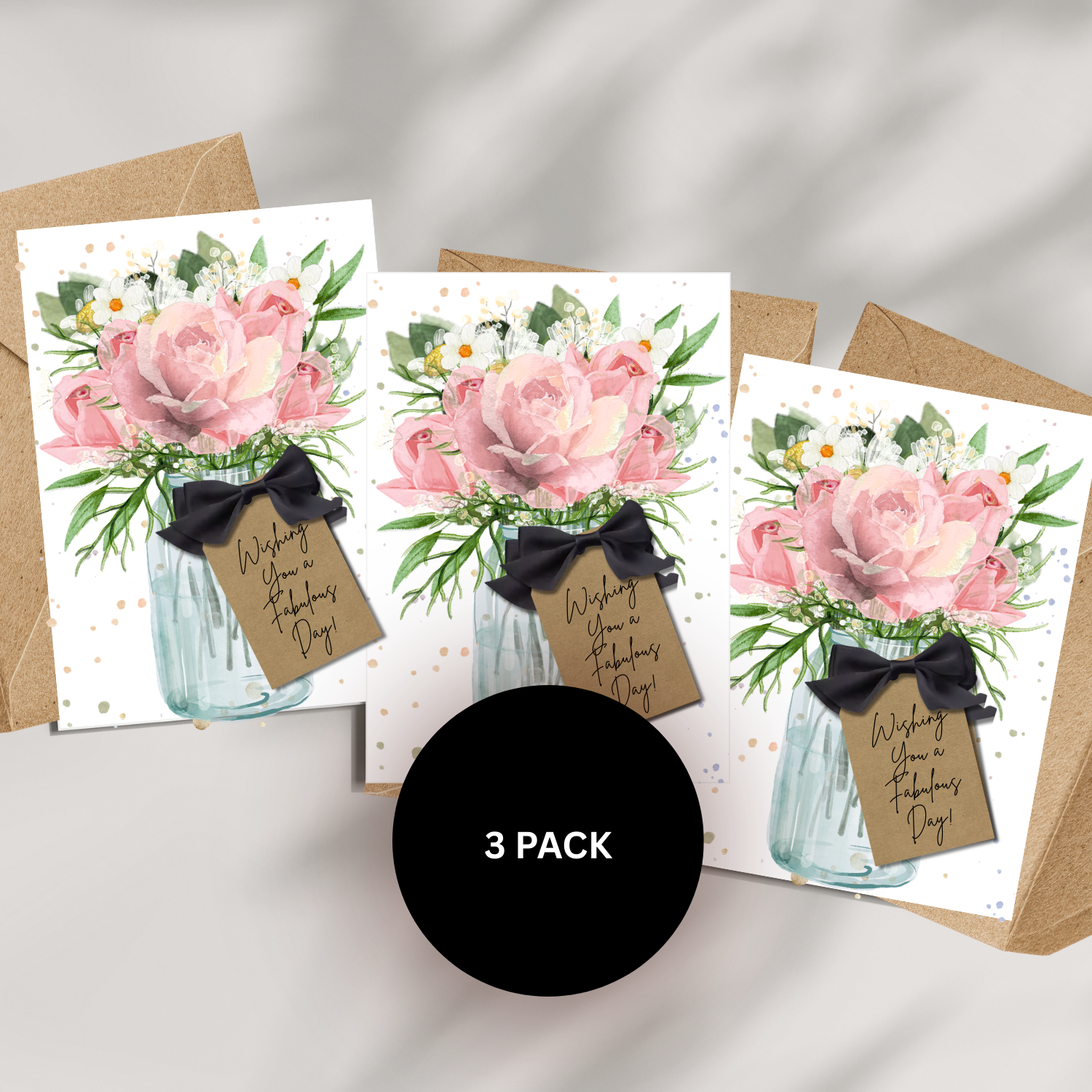 Three floral greeting cards with blush pink roses and black ribbons scented with rose and personalised inside