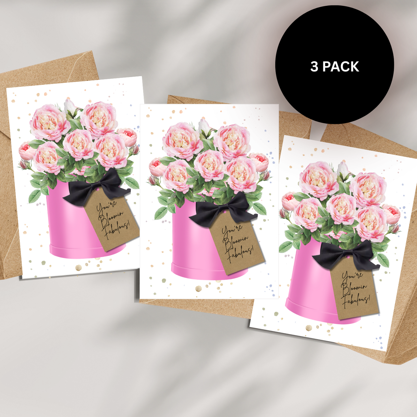 Pack of Three floral peony greeting cards perfect for birthdays handmade with pink flower print in a pot and a tag made with 3d satin bow and fragranced with peony to wow the recipient. Peony cards come with a5 kraft envelopes. Card sin the pack are individually wrapped to keep their freshness until you're ready to us them.
