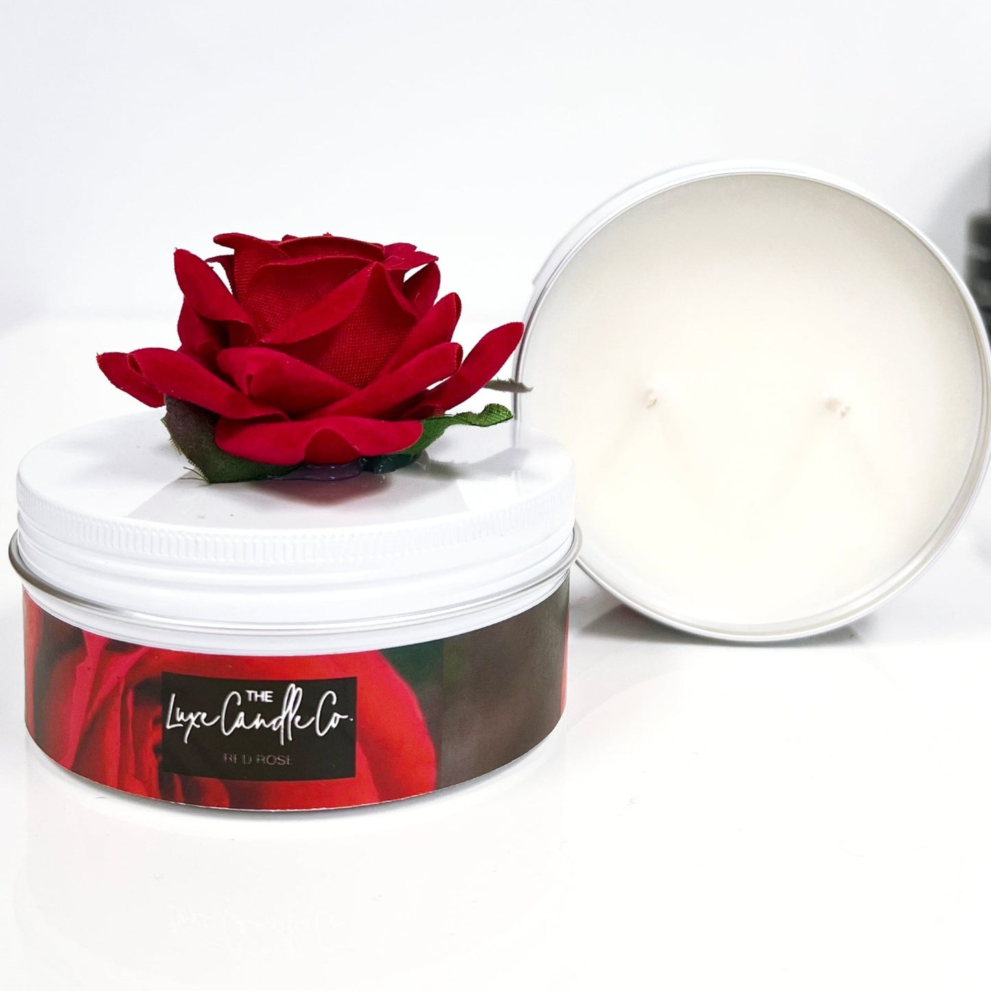red rose scented candle in tin