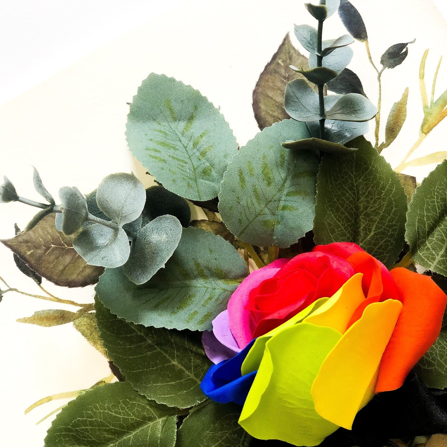 Close up of the scented Rainbow rose birthday card 